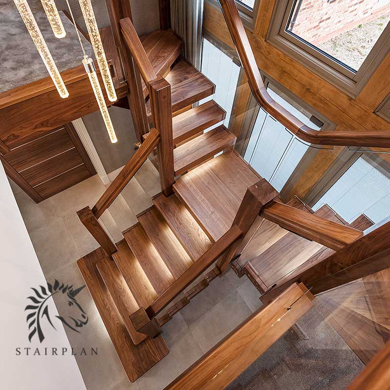 Luxury american black walnut staircase design with glass